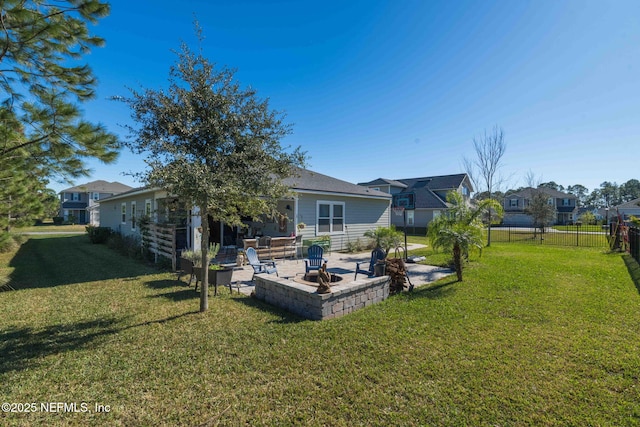 back of property with a patio and a lawn