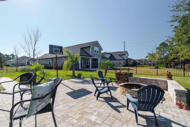 view of patio featuring an outdoor fire pit