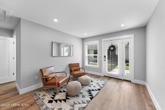 sitting room featuring light wood-type flooring