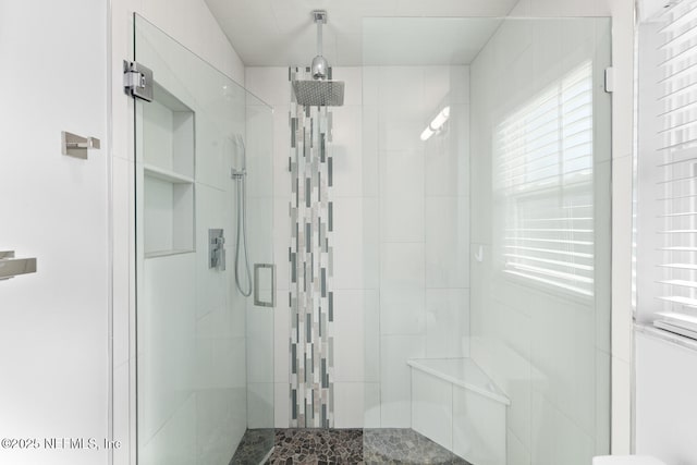 bathroom with walk in shower