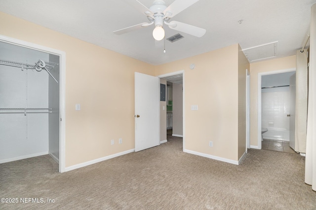 unfurnished bedroom with ceiling fan, a closet, and light colored carpet