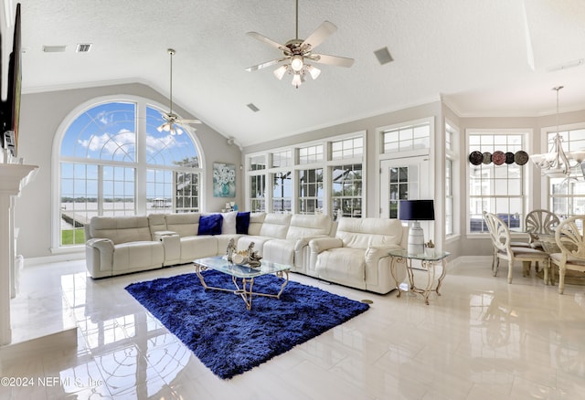 living room featuring ceiling fan, ornamental molding, a textured ceiling, and vaulted ceiling