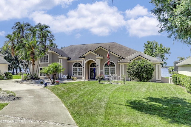 view of front of property with a front lawn