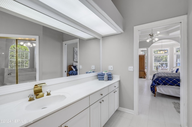 bathroom featuring tile patterned floors and vanity