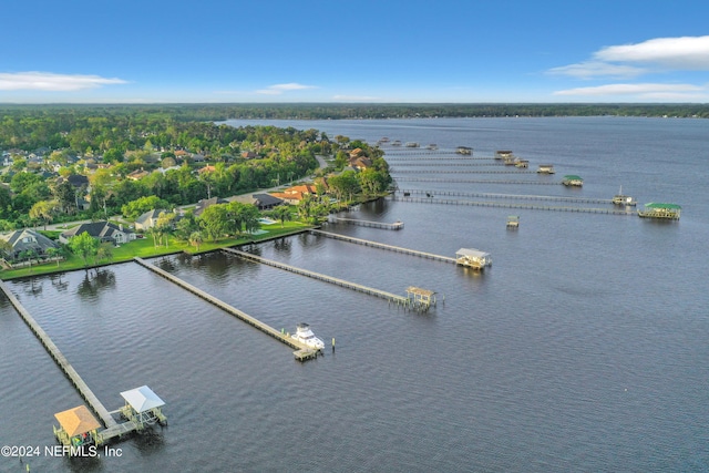 birds eye view of property featuring a water view