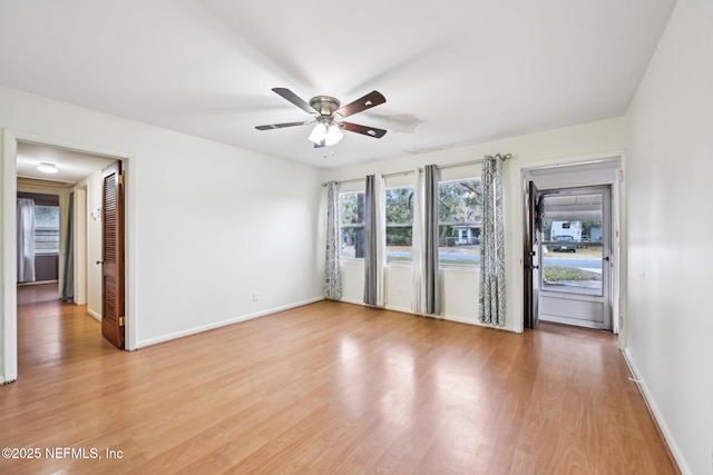 spare room featuring ceiling fan and wood-type flooring