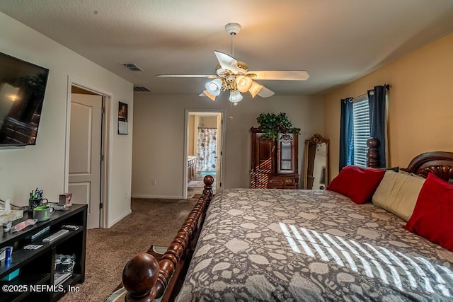 carpeted bedroom featuring ensuite bath and ceiling fan