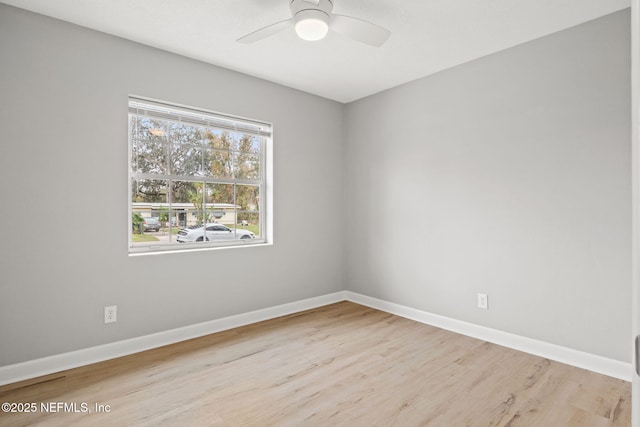 unfurnished room with ceiling fan and light hardwood / wood-style flooring