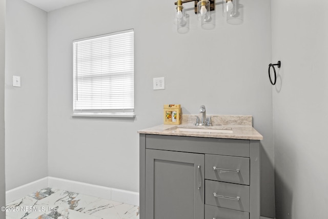 bathroom featuring vanity and a wealth of natural light