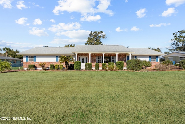 ranch-style home with a front lawn