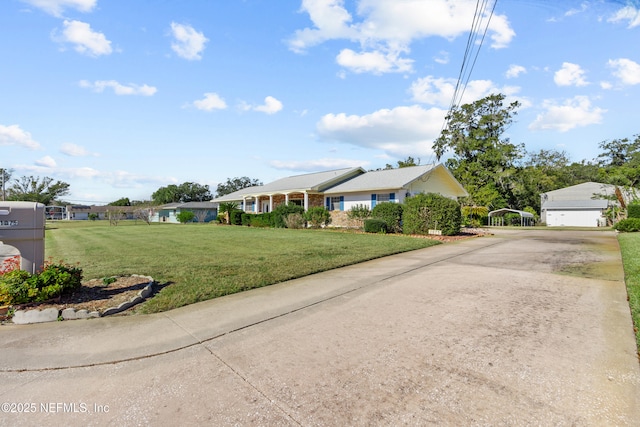 single story home with a front yard and a carport