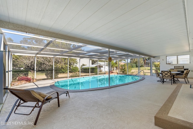 view of pool featuring a lanai and a patio area