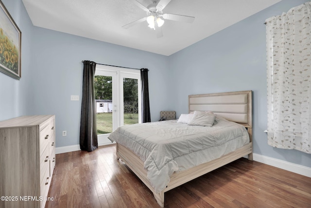 bedroom featuring ceiling fan and dark wood-type flooring