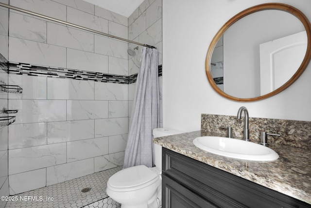 bathroom with a shower with curtain, vanity, and toilet