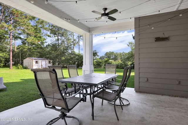 view of patio featuring a storage unit and ceiling fan