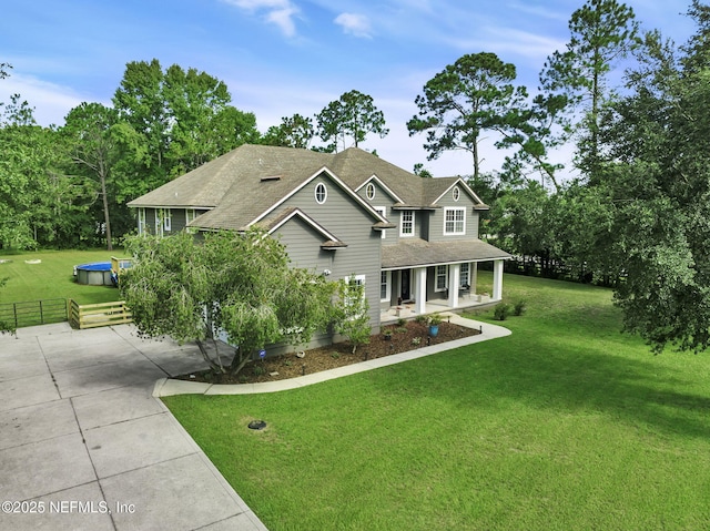 craftsman-style house featuring a front yard and a porch