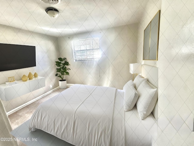 bedroom featuring tile patterned floors