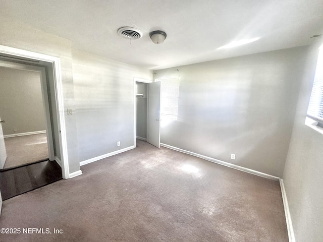 unfurnished bedroom featuring carpet flooring