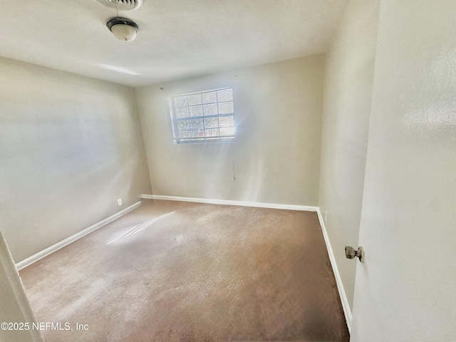 view of carpeted spare room