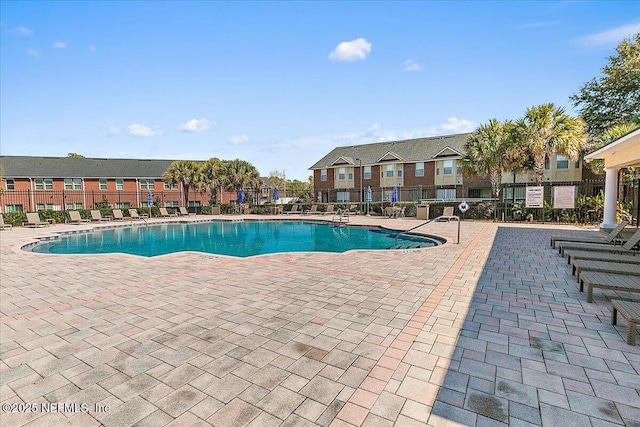 view of swimming pool featuring a patio