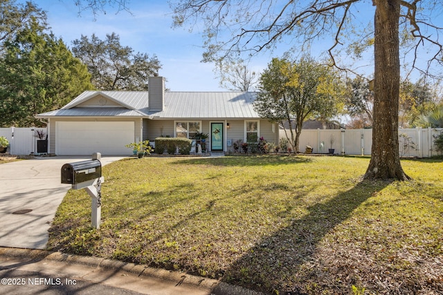 single story home featuring a garage and a front lawn