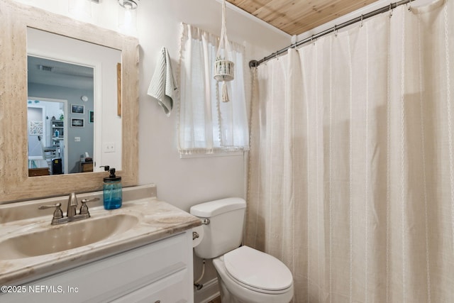 bathroom with vanity, toilet, wooden ceiling, and walk in shower