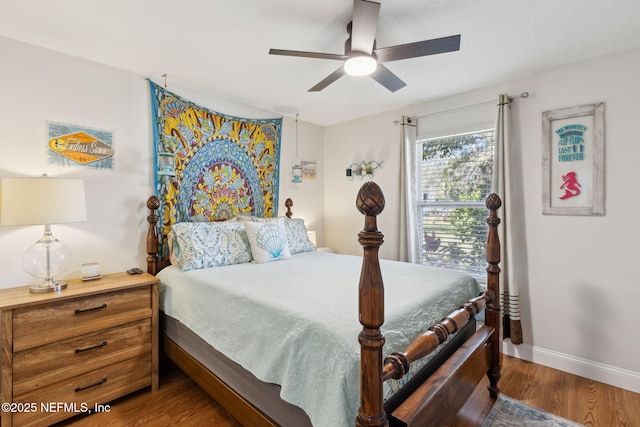 bedroom with ceiling fan and wood-type flooring