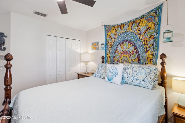 bedroom featuring ceiling fan and a closet