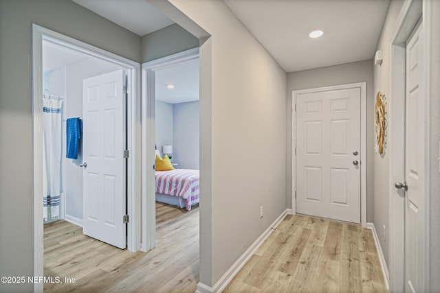 hallway featuring light hardwood / wood-style floors