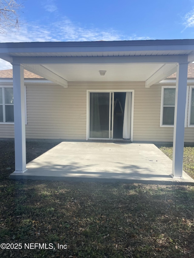 rear view of house with a patio area