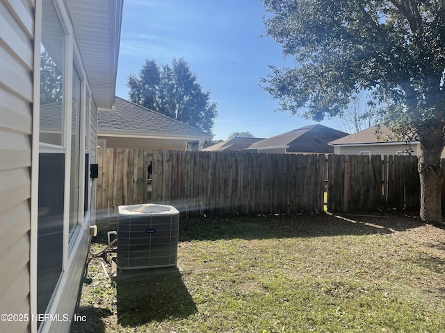 view of yard featuring central AC