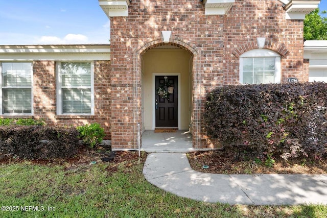 11786 Huckleberry Trl E, Macclenny, FL 32063 - view of exterior entry with brick siding