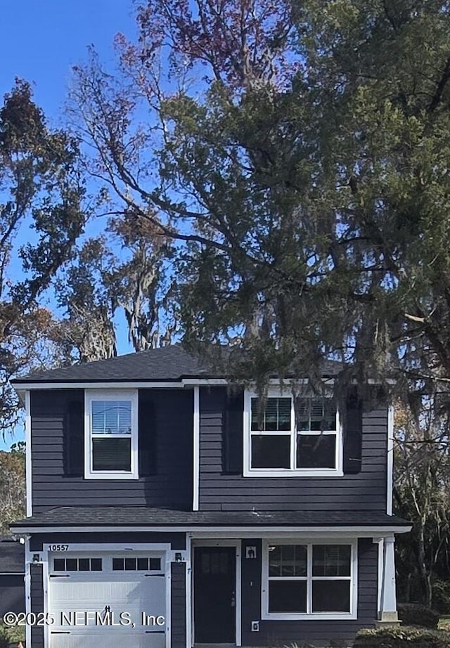 view of front of property featuring a garage