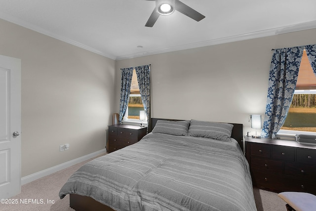 bedroom with crown molding, light carpet, and ceiling fan