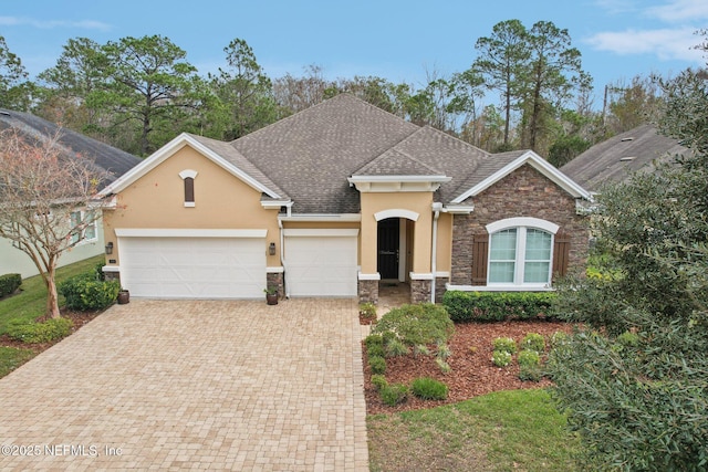 view of front of home with a garage