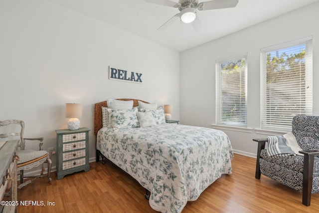 bedroom featuring ceiling fan and hardwood / wood-style floors