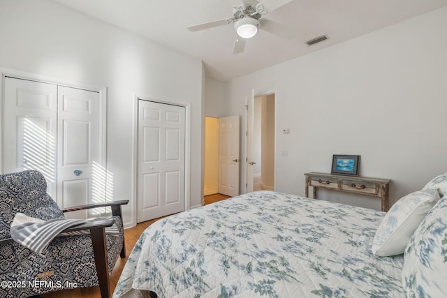 bedroom with ceiling fan and hardwood / wood-style flooring