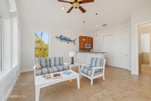 living room with ceiling fan