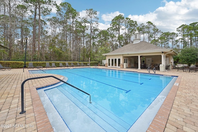 view of swimming pool featuring a patio