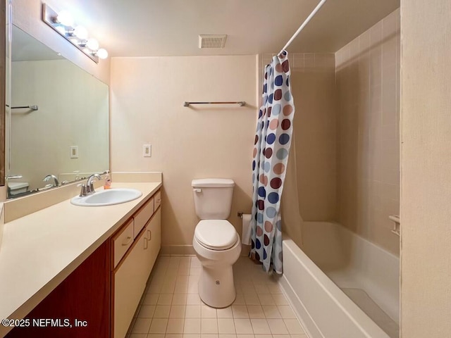 full bathroom featuring toilet, vanity, tile patterned floors, and shower / tub combo with curtain