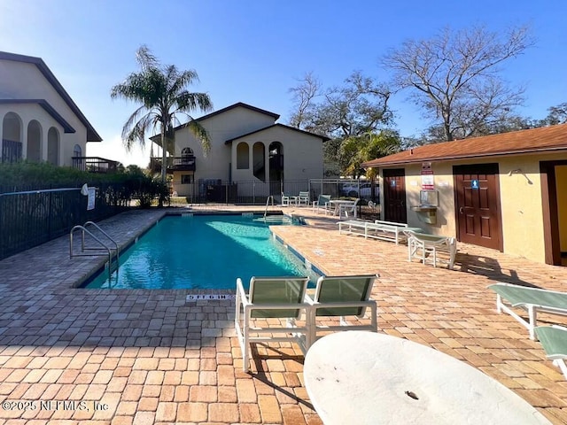 view of pool featuring a patio area