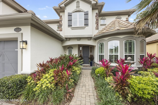 entrance to property featuring a garage