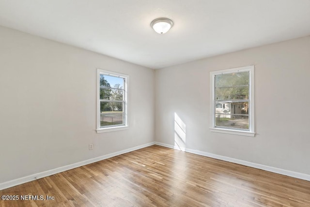 empty room featuring hardwood / wood-style floors