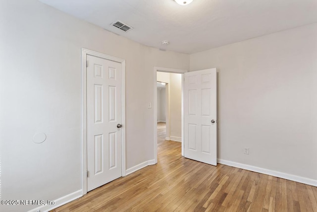 unfurnished bedroom with light hardwood / wood-style flooring