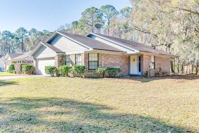 ranch-style home with a front yard and a garage