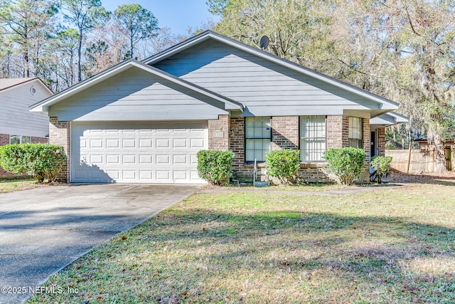 view of front of home featuring a garage and a front yard