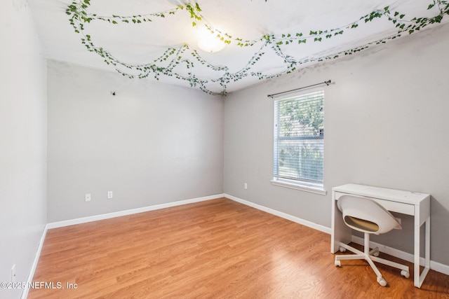 interior space with hardwood / wood-style floors