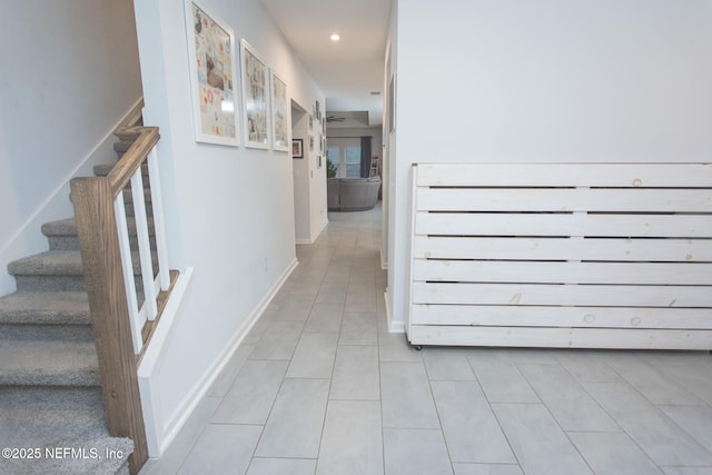 hallway with light tile patterned flooring