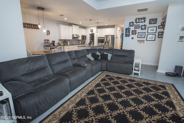 tiled living room with sink