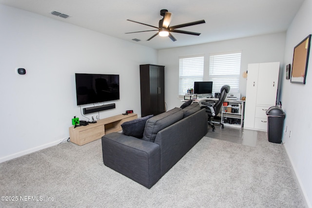 living room with carpet flooring and ceiling fan